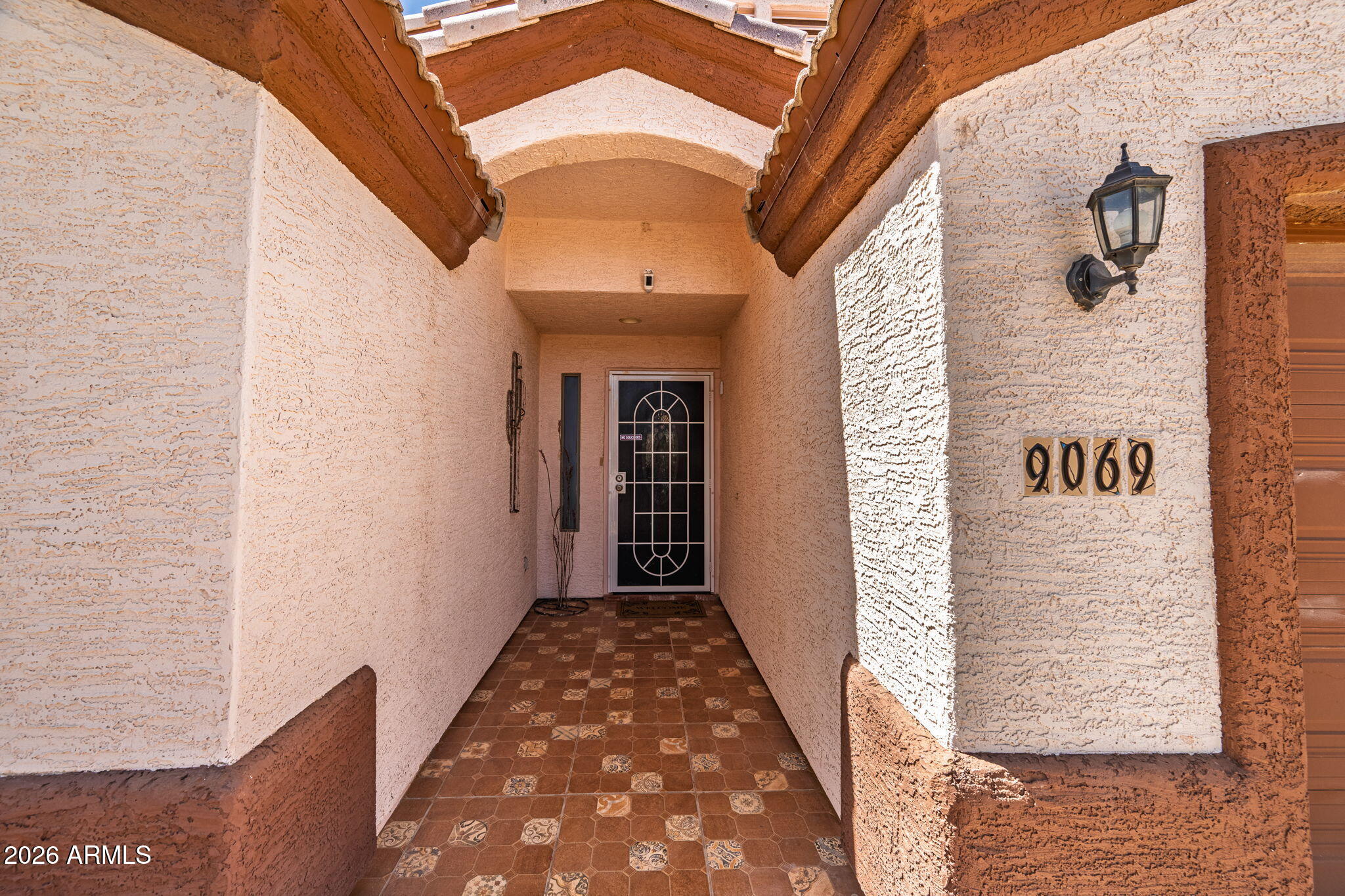 9069 W RAVEN Drive