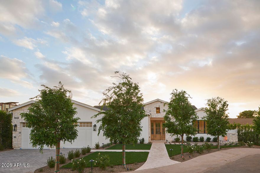 Tucked away in a charming cul da sac in Arcadia Lite, this brand-new construction home offers unparalleled tranquility.