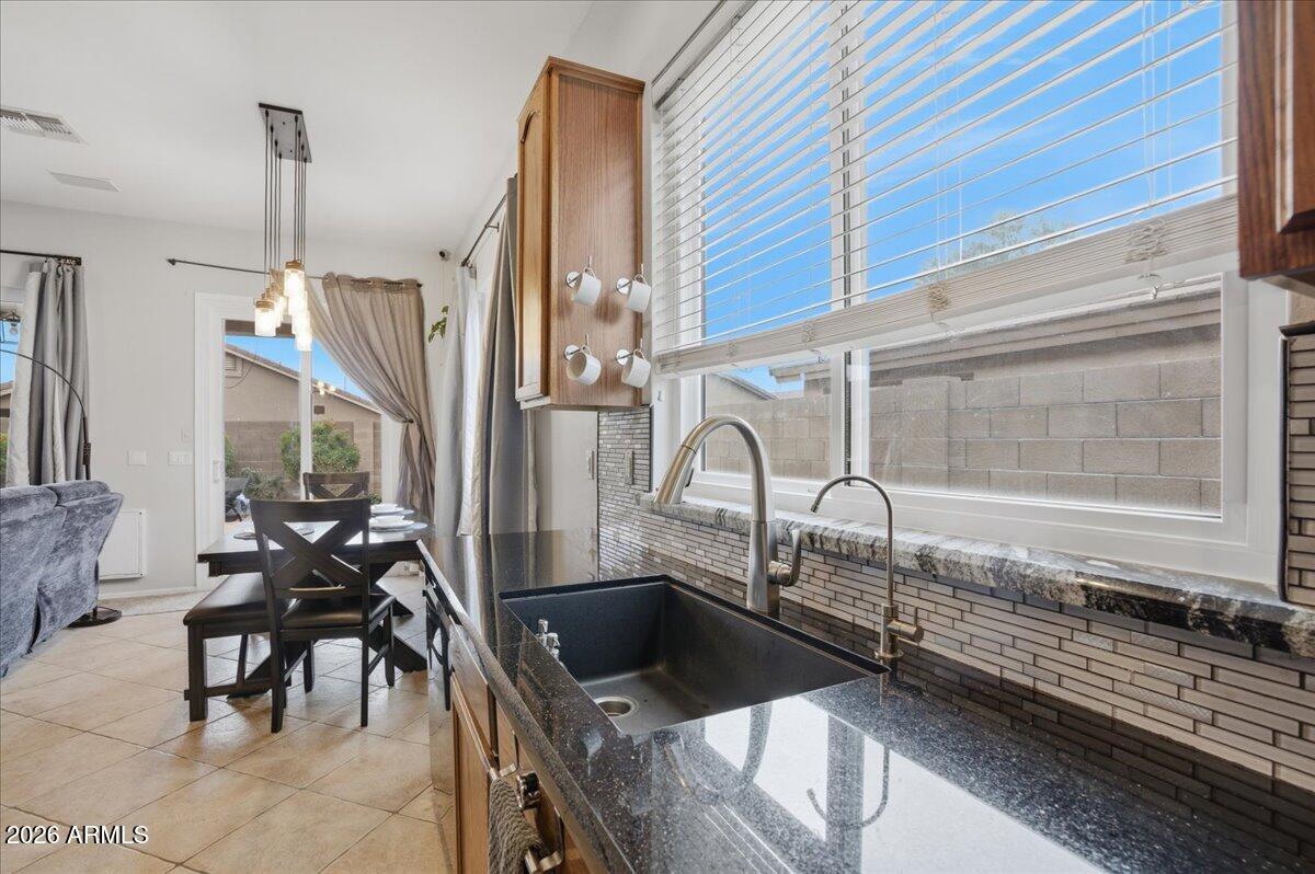 8761 E OBISPO Avenue