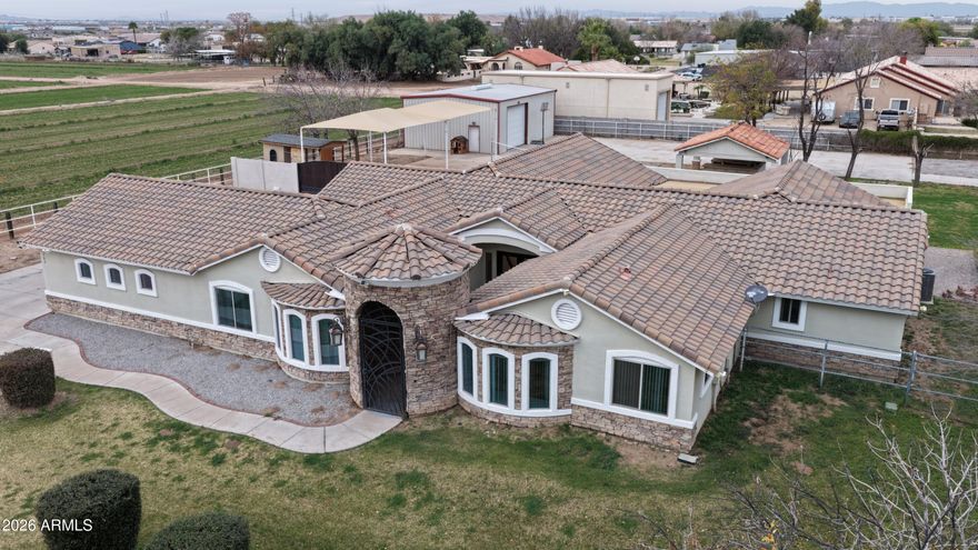 One of a Kind Arizona Estate: No HOA, No Limits.
Welcome to a truly rare find! Set on a lush, irrigated lot, this extraordinary property delivers the space, freedom, and amenities that most buyers only dream about. From the moment you arrive, you'll feel the difference.
Inside, generous living spaces and abundant natural light create a warm, inviting atmosphere. Multiple bedrooms include a beautifully converted garage suite perfect for guests, multi generational living, or a private home office. Unwind in your very own steam sauna, or soak up the Arizona sunshine in the charming Arizona room.
Outside is where this property truly sets itself apart. A massive 2,000 sq. ft. hangar style storage building offers endless possibilities store vehicles, run a home-based business, or pursue One of a Kind Arizona Estate: No HOA, No Limits.
Welcome to a truly rare find! Set on a lush, irrigated lot, this extraordinary property delivers the space, freedom, and amenities that most buyers only dream about. From the moment you arrive, you'll feel the difference.
Inside, generous living spaces and abundant natural light create a warm, inviting atmosphere. Multiple bedrooms include a beautifully converted garage suite perfect for guests, multi generational living, or a private home office. Unwind in your very own steam sauna, or soak up the Arizona sunshine in the charming Arizona room.
Outside is where this property truly sets itself apart. A massive 2,000 sq. ft. hangar-style storage building offers endless possibilities store vehicles, run a home-based business, or pursue your hobbies in style. Covered RV parking and room for all your toys make this a hobbyist's paradise. Gather under the gazebo with built-in BBQ grill, surrounded by manicured, irrigated landscaping that stays lush year-round.
All of this, just minutes from Westgate, top dining, shopping, and freeway access because convenience should never be compromised.
Resort style living. Zero HOA. Unlimited potential. Come see it for yourself.