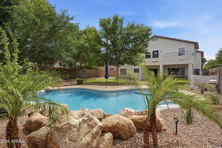 Immaculate 5-bedroom home with den in the prestigious Red Mountain Ranch community of northeast Mesa. Freshly painted inside and out with new flooring and updated kitchen and bathrooms, this beautiful home is move-in ready. The backyard oasis features a gorgeous play pool with brand new pebble tec, mature shade trees, and an extended covered patio. And the location is phenomenal, with Salt River Recreation area and Tonto National Forest close by, as well as easy access to shopping, dining, and the 202.