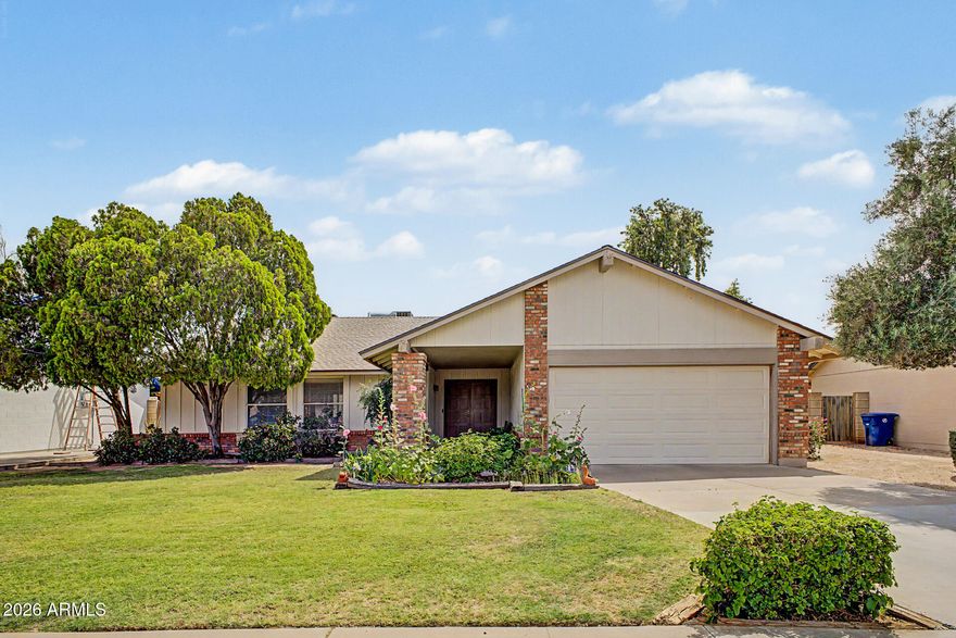 Everyday comfort meets smart peace of mind in this well located Chandler home, where meaningful updates and inviting outdoor charm come together beautifully. This 3 bedroom, 2 bath residence offers 1,558 square feet with Shaw engineered hardwood flooring, ceramic tile, plantation shutters in the primary bedroom, and an Andersen gliding patio door. Outside, enjoy a cottage style garden with mature landscaping and a navel orange tree. A new roof in 2025 and new heat pump in 2023 add valuable confidence. Near a renovated park with pickleball, basketball, and playground areas, plus shopping, Chandler Fashion Center, the tech corridor, and the 101. A standout opportunity in a central Chandler location.