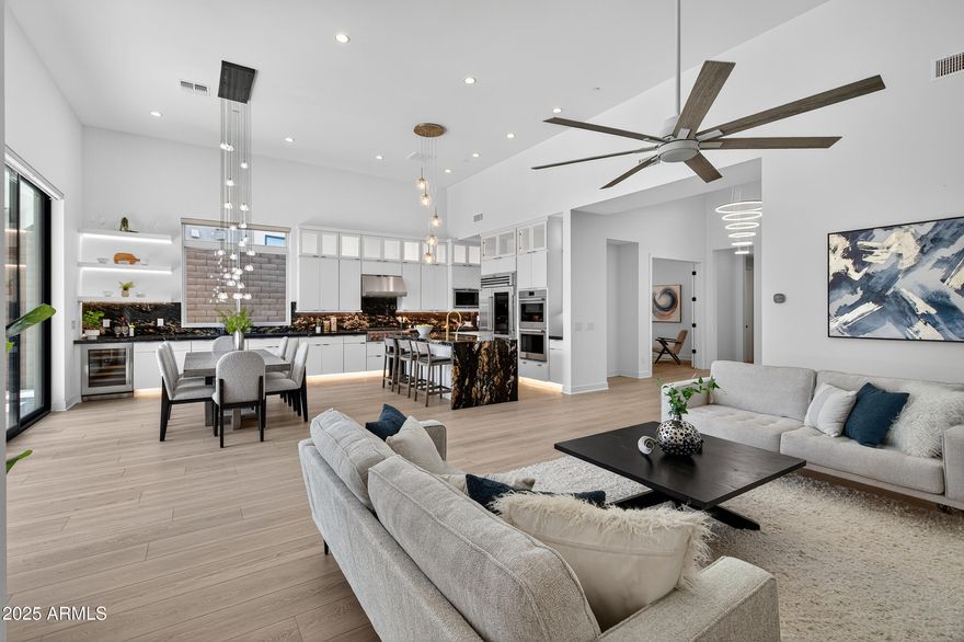 Some homes are beautiful. This one is transformative.

Set within Fountain Hills' coveted Adero Canyon Dark-Sky community, this 2023 contemporary masterpiece was built for those who live intentionally. The showpiece kitchen features Calacatta black marble waterfall islands, Sub-Zero and Wolf appliances, and LED-accented floating shelves flowing into a serving bar designed for effortless entertaining. Every bedroom suite offers a custom closet and a spa-inspired en suite with bronze Kohler fixtures and modern bidets. Dual-stage AC systems, enhanced insulation, and a whole-home water refinement system deliver quiet, spa-quality comfort year-round -- in both the main residence and private casita. Outdoors, a Zen-inspired limestone patio and sculpted Fibonacci meditation circle invite stillness beneath one of Arizona's most celebrated dark skies.

With over $200,000 in builder upgrades and THIRDHOME elite exchange eligibility -- access to 14,000+ luxury properties in 100 countries -- this is the rare home that gives back as much as it offers.