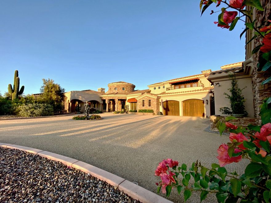 Gentleman's 4.69 acre horse ranch with incredible city & mountain views and all the bells and whistles. It includes a 7,382/sf 4 en-suite bedroom custom home (one level except an upper level guest suite), plus a 1,600/sf 2 bedroom guest house,  9 car + RV garage, lighted tennis court, salt water pool and spa with clear view of the stars above, 4 stall barn w/Tack room and walker.  The formal Living room has an adjoining wet bar & wine closet and the formal dining room w/adjoining Butler's pantry. A beautiful family room with fireplace adjoins the kitchen. The center island kitchen is decked with wolf stove, Sub Zero Fridge, 2 dishwashers, 2 warming drawers, multiple ovens. The master suite has his and her closets with its own washer and dryer and an adjoining fitness room and sauna. more. Fine finishes abound. Also included is a 4 stall horse barn with automatic waterers, wash station, horse walker, and large Tack room. Room on property for an arena. The perfect Gentleman's Horse Ranch.