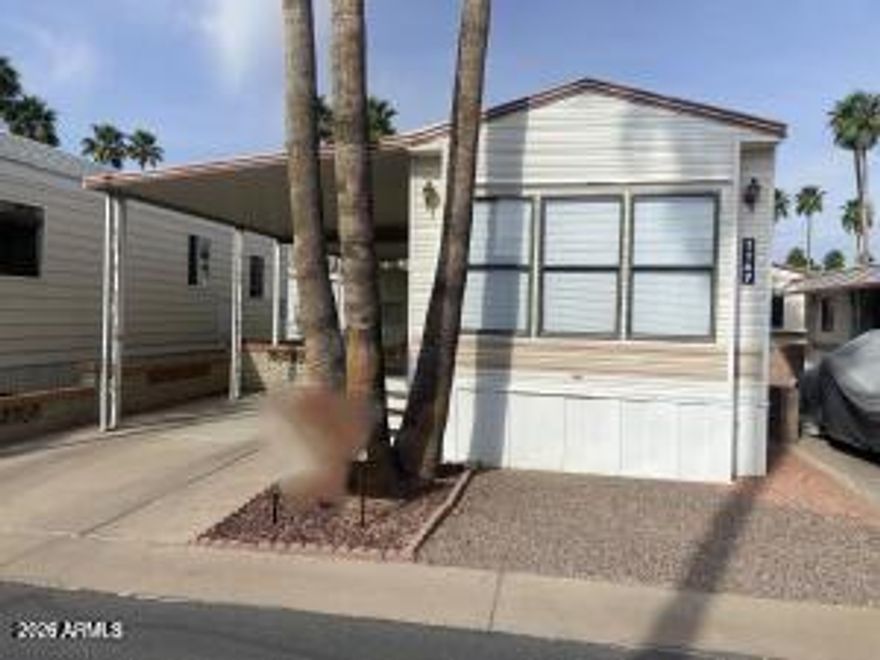 Don't pay high monthly lot rental fees! Own the land in this golf course resort community 55+. This light & bright winter retreat is affordable resort living! This well maintained 1988 has 1 bedroom and recently updated 1 bathroom and will impress!  Solid surface flooring throughout, dishwasher, private covered patio with room to park your vehicle. All furnishings are included! Large shed/laundry with washer/dryer included. East facing on a very quiet street, short walk to the community pools and recreation center! Can be shown on short notice!