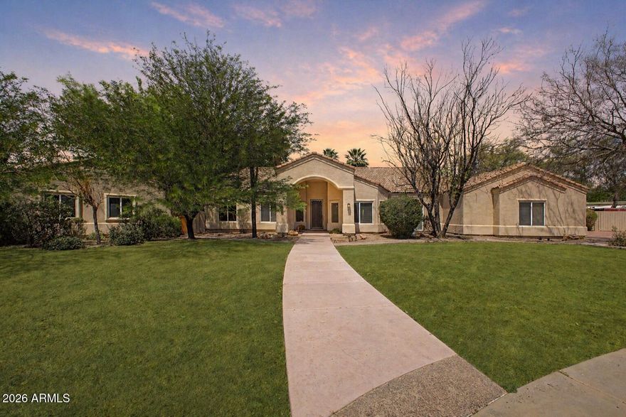 Located within the prestigious Spyglass Estates, this exceptional single-level estate sits on nearly an acre in a quiet cul-de-sac, offering a rare level of privacy. Bordering a vast open grassy area, the property enjoys an expansive, estate-like setting with no immediate intrusion--creating a truly secluded and exclusive atmosphere.
The home features a split floor plan, soaring vaulted ceilings, wood-look flooring, arched passageways, abundant natural light, and built-in speakers throughout. The chef's kitchen is upgraded with high-end appliances, custom cabinetry, granite countertops, tile backsplash, and a spacious island ideal for entertaining.
The backyard is a true resort-style oasis with a resurfaced pool, expansive grass areas, putting green, ramada, and covered patio, all design for ultimate privacy and relaxation. A detached casita provides its own living space, kitchen, and private patio--perfect for guests or multigenerational living. Additional highlights include a 3-car garage, RV storage, new roof on the main home/gazebo, New AC and new water heater in both home and casita.