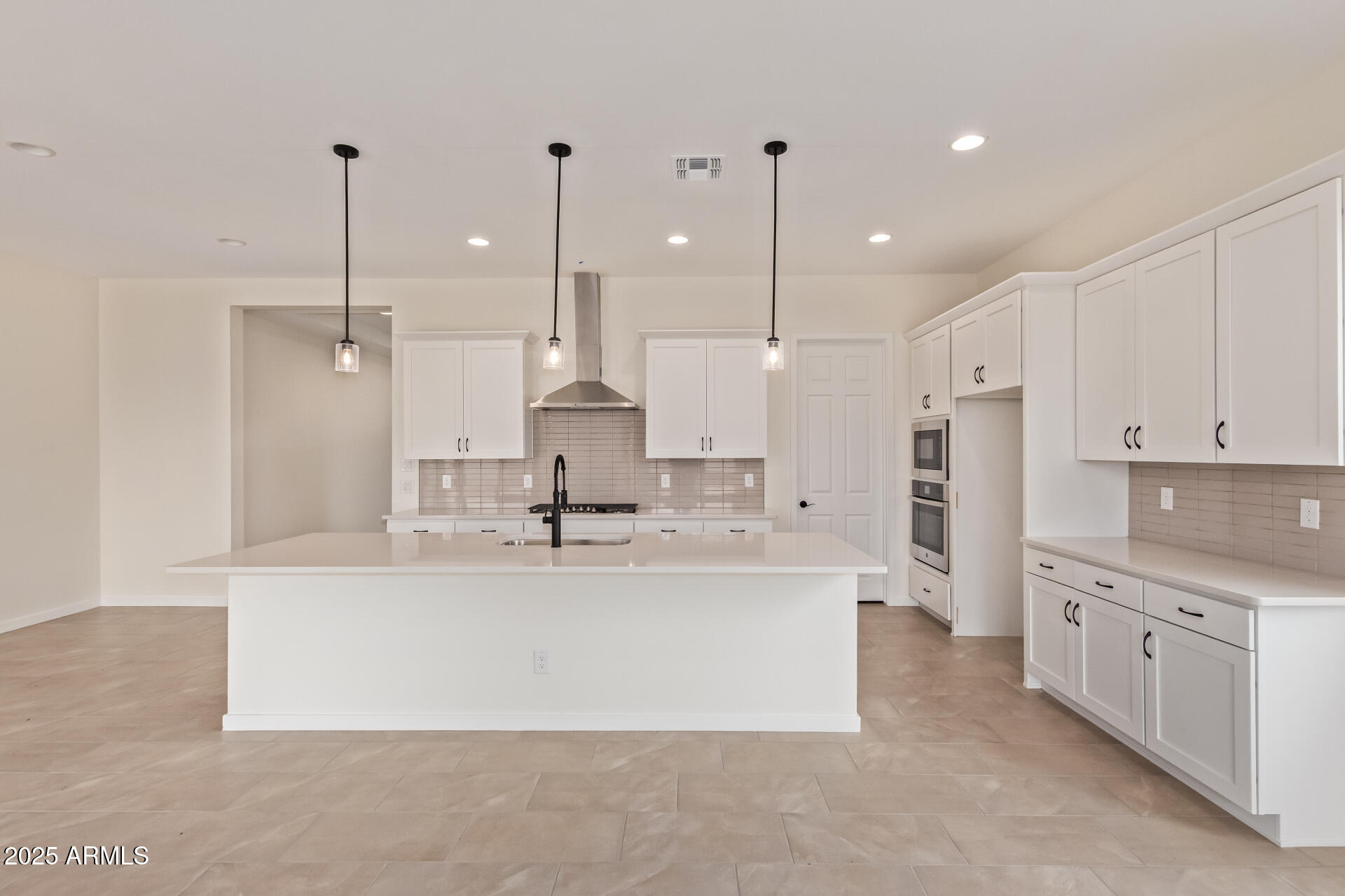 11937 W MARGUERITE Avenue