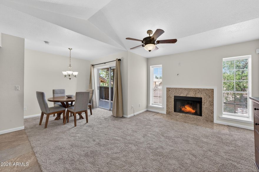 Beautifully updated condo offers comfort, convenience, and major value in the heart of Tempe. Enjoy peace of mind with a newer A/C unit replaced in 2023 and a location just 2 miles from Arizona State University along Tempe Orbit's free bus line for easy commuting.
The upgraded kitchen features granite countertops, tile backsplash, new stainless steel appliances, and a new sink. The inviting living area includes a cozy wood-burning fireplace, while the private deck overlooks the beautifully maintained interior grounds of the community.
Residents enjoy resort-style amenities including a pool, clubhouse, and large grassy areas perfect for pets and outdoor enjoyment. Seller will also pay the HOA transfer fees, helping reduce upfront costs for the buyer. The bathroom has been fully updated with a new tub and shower with tile surround, along with updated plumbing, vanity, and toilet, giving it a modern, refreshed feel. A stackable washer and dryer are conveniently tucked into the kitchen area and included with the home.  HOA fee covers - Water; Sewer; Garbage Collection, Exterior Mnt of Unit; Roof Repair; Roof Replacement

Step out onto the private balcony to enjoy views of the pool, with additional storage space both in the unit and outside, making organization effortless.

With community amenities on-site and everyday conveniences just a short walk away, this home offers a lifestyle that feels both connected and comfortable.
