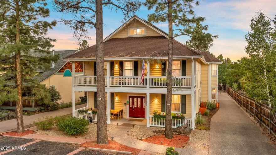 Experience Flagstaff living at its most versatile. This one-of-a-kind property at 303 Juniper is just one mile from historic downtown. It offers the perfect balance, close enough to enjoy the charm of town, yet tucked away from the daily bustle. Whether you're searching for a private luxury residence, thriving short-term rental, or turn-key bed & breakfast, this adaptable estate is ready for your vision. Sitting on .25 of an acre, the home has been completely renovated and remodeled, and comes fully furnished! The main level features a gourmet chef's kitchen with a spacious island, dual sinks, six-burner range, oversized fridge, and generous pantry. The living room is spacious and cozy, with a gas fireplace, water feature, and tons of windows. There are two bedrooms on the main level. One is an attached but separate unit with a private outdoor sitting area, a spa-like jetted bath, and a steam shower.

Upstairs is incredible with a covered balcony with ample seating, and 2 swings. Each of the beautiful 4 upstairs bedrooms is appointed with its own ensuite bath, blackout drapes, smart TV, and thoughtful details. No more bathroom wars! Recent upgrades include radiant in-floor heating, solar conversion, two new water heaters, mini-split climate control in every room, and a Nest security system.

For leisure and entertainment, the property boasts a theater/game room with 75" TV, shuffleboard, custom poker table, and reclining theater seating. A fully equipped gym, landscaped grounds, new carpets, feature accent walls, and designer lighting add to the charm.

The home also comes with a 3 car garage, a rare thing this close to downtown! Ample storage and parking spaces.

Enjoying Flagstaff's four seasons under the pines, 303 Juniper presents endless possibilities. Whether as the ultimate single family home, multi-generational home, investment, mountain retreat, or lifestyle business, this roof has you covered (pun intended).