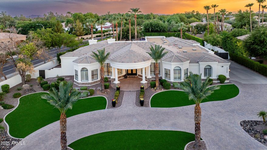 This extraordinary residence in the prestigious Circle G neighborhood has been completely remodeled from top to bottom, blending timeless design with luxurious modern amenities. Offering 5,145sf of living space, this home features 5 bedrooms, 5.5 bathrooms, and a versatile bonus/game room with direct access to the backyard. The open floorplan showcases soaring ceilings and expansive windows, filling the interiors with natural light and creating an inviting atmosphere throughout!
At the heart of the home, the stunning kitchen boasts high-end finishes, custom cabinetry, and a spacious island for gathering. A newly added butler's kitchen provides extra prep and storage space. Throughout the home, you'll find engineered hardwood floors, designer lighting, and custom steel-and-glass doors. The primary suite is a true retreat, offering a spacious layout with a spa-like bathroom featuring a soaking tub, spacious walk-in shower, dual vanities, and a private sauna. 
Situated on an impressive .85-acre lot, the outdoor living is just as remarkable. Mature, tree-lined walls surround a sparkling pool and spa, sport court, wraparound patio, and a large turf lawn. An outdoor kitchen island completes the entertainer's backyard, ideal for hosting gatherings of any size.
This home has it all - style, function, and resort-style living in one of Chandler's most coveted neighborhoods. Furnishings are also available by separate bill of sale, offering a rare opportunity to move right in and enjoy this extraordinary home from day one!