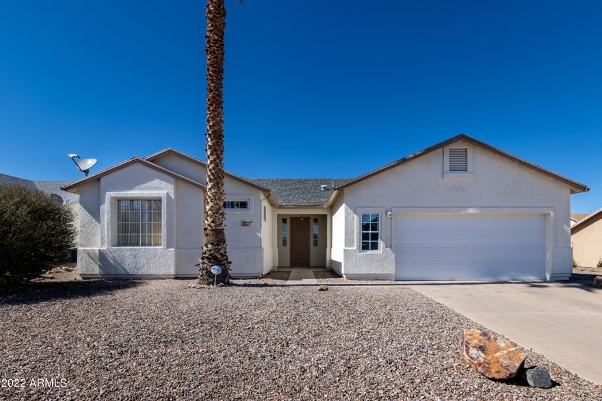 Move in ready home located in a desirable neighborhood very close to a desirable elementary school. This lovely 3 bed 2 bath home just received new two-tone exterior paint and a landscaped make over. Newer AC for those hot summer days. Inside you will find a large open floor plan concept with a large kitchen that overlooks the dining room and living room. There is large and wood look a like tile in all high traffic areas including the master bedroom.  Master bedroom is large with an oversized patio door leading to the backyard. Walk in closet and great master bathroom. Two very nice sized bedrooms on the other side of the home with another bathroom. This home will not last long so please call for a private showing.