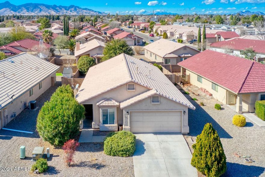 Spacious 4 bedroom, 2 bath, 2 car garage home located in Chaparral Village, a nice family neighborhood with a community park and close proximity to medical, shopping, restaurants and Ft Huachuca.  The home offers a  split floor plan, vaulted ceilings, good sized laundry room and nice backyard.
Not on an HOA.  Schedule your showing today!!