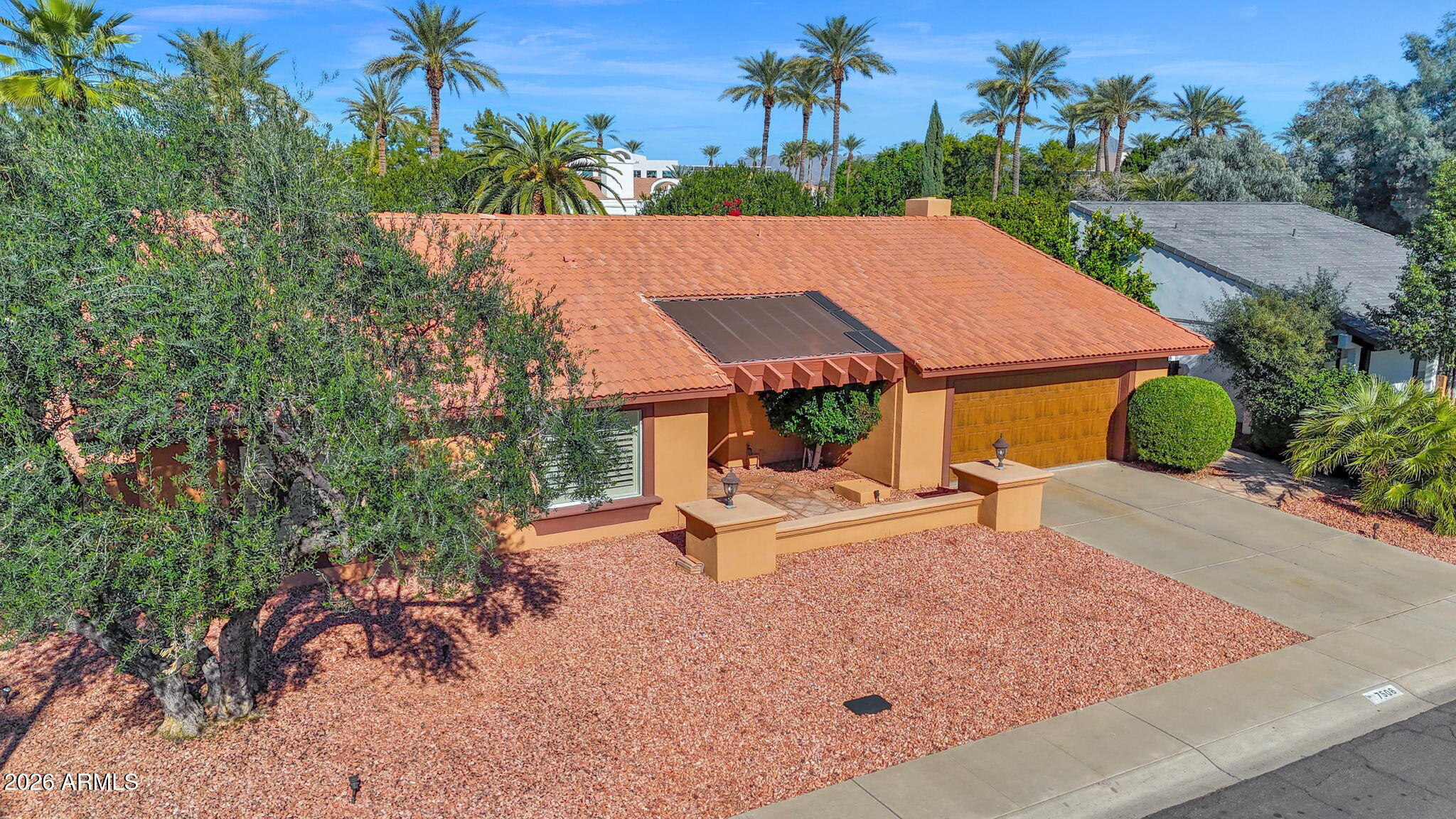 7506 E WOODSAGE Lane