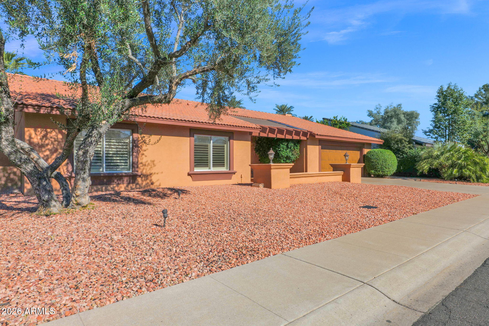 7506 E WOODSAGE Lane