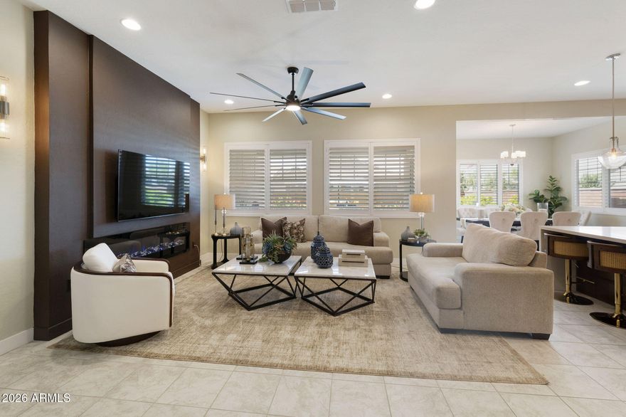Why wait for a new build when your dream home is move-in ready? Welcome to this beautifully upgraded 4-bedroom, 3-bath home in the sought-after Ellsworth Ranch community in Queen Creek. Situated on a premium corner cul-de-sac lot with north/south exposure and mountain views, this home offers comfort, style, and functionality. The open-concept layout features a spacious great room, formal dining area, and dedicated home office. The gourmet kitchen showcases stunning waterfall quartz countertops, a large island, walk-in pantry, built-in microwave, dishwasher, and refrigerator. The split primary suite offers a spa-inspired bath with dual sinks and an oversized walk-in closet. Additional highlights include tile and carpet flooring, Energy Star dual-pane windows, inside laundry with washer and dryer included, and a 2-car extended garage. Enjoy the covered patio and beautifully designed backyard spaces ideal for entertaining, relaxing, and PET FRIENDLY living. Residents enjoy resort-style amenities including parks, pickleball courts, clubhouse, pool, and close proximity to top-rated schools, shopping, dining, golf, hiking, and freeway access.