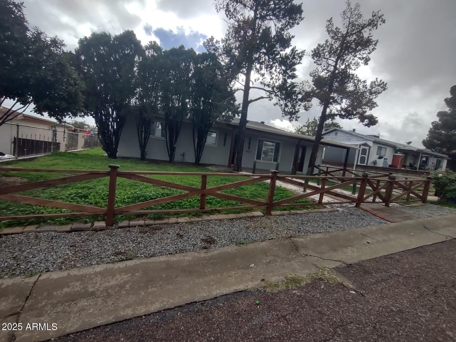 7927 E PUEBLO Street