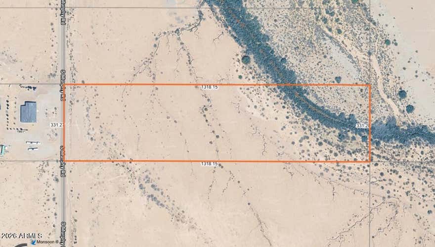 Beautiful, raw acreage in Stanfield, just minutes west of Casa Grande! 10 acres close to power ready for your development. Great investment opportunity! Flat with natural vegetation. Wash at the east side of the property, but lots of room for the home, cars, machinery and animals. Easy access to the I-8!