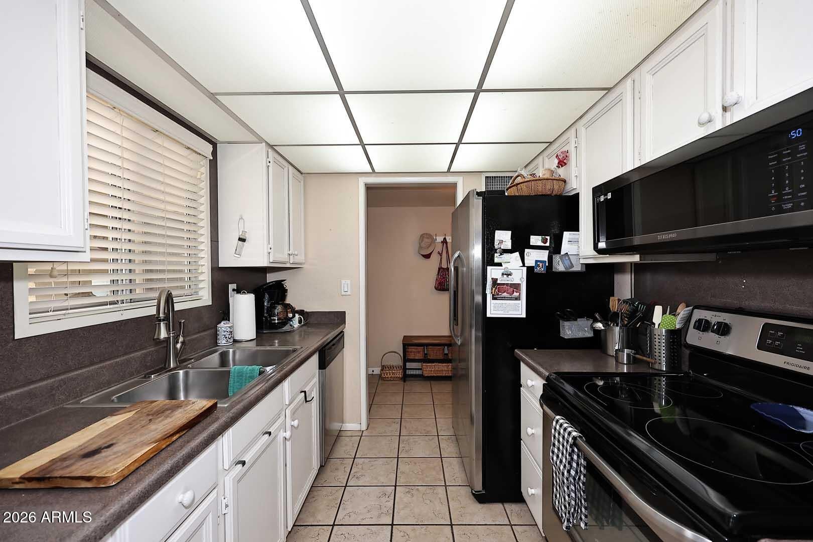 9713 W LANCASTER Drive
