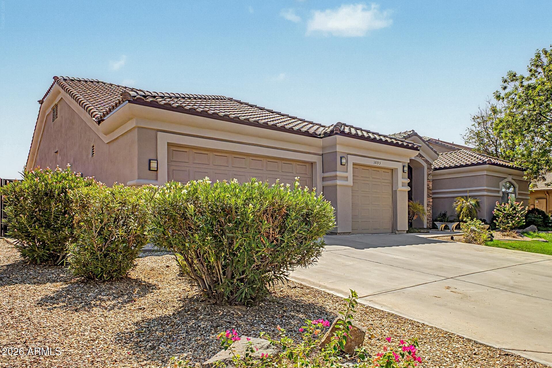 1095 N JAMAICA Court