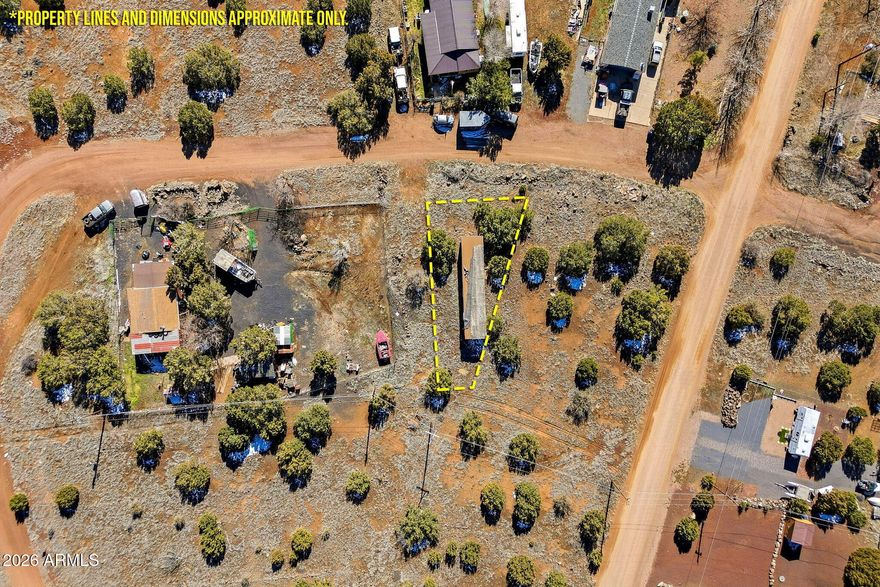 Don't miss out on this .1 acre parcel in the White Mountain Lakes community—your ticket to escape the big city chaos and trade honking horns for chirping birds! With easy access, this is a great property to add to your portfolio or create your own off-grid retreat. The unaffixed trailer conveys with the property (glamping headquarters, anyone?). Perfect for those who love the great outdoors and don't mind roughing it a bit—no utilities on the property, but who needs them when you've got fresh mountain air and starry skies? Embrace your inner adventurer and make this slice of serenity yours!