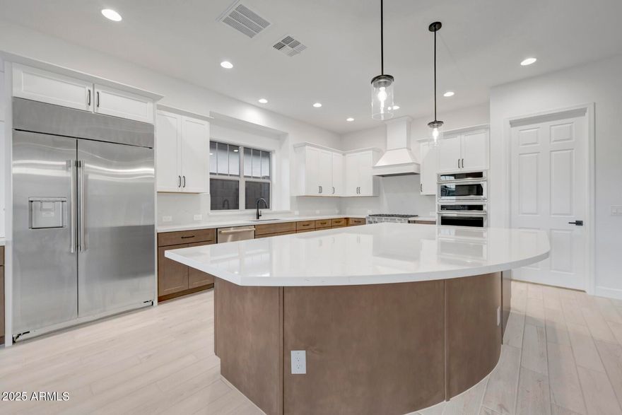 BRAND NEW 3 bed, 3.5 bath, enclosed study single level home with interior courtyard showcasing a huge gas fireplace, and 3 car garage; gorgeous huge chef's kitchen with large center island, walk-in pantry, GE Monogram appliances with 42'' built-in refrigerator; 16' and 9' sliding glass doors and large energy efficient windows; door connects utility room to owner's closet; huge walk-in shower with two showerheads and soaking tub in owner's bath; private backyard with extended covered patio; 2x6 construction and extensive new home warranty.