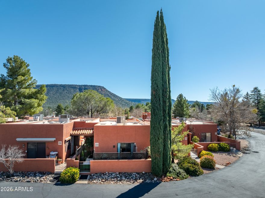 Enjoy breathtaking Sedona red rock views from this fully renovated 2-bedroom, 2-bath condo with garage in the desirable Village of Oak Creek, Sedona. 

Enjoy stunning red rock views and a prime walkable location near restaurants, coffee, shopping, and hiking trails.

Features include new paint, flooring, lighting, skylights, luxury tile shower, new appliances, and granite/quartz countertops. Exterior upgrades include stucco (2024), resurfaced roofs, and paved driveways.

Long-term rentals and Furnished Finder allowed, ideal for a Sedona investment property, second home, or full-time residence.

Optional Hilton Resort membership offers spa, fitness, pools, pickleball, tennis, and golf.

Furnishings available separately.