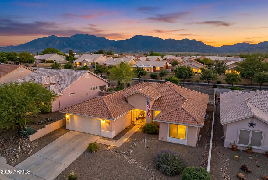 Welcome home to this beautifully maintained Ironwood model located in the gated, age-restricted community of Winterhaven. From the moment you arrive, you'll appreciate the inviting curb appeal, stunning mountain views, and peaceful neighborhood setting. Inside, the spacious living room offers a warm and welcoming atmosphere with a cozy fireplace, perfect for relaxing evenings at home.

The thoughtfully designed floor plan features a formal dining area, a bright and spacious kitchen with pull-out cabinetry, ample counter space, and a charming breakfast nook ideal for casual dining and morning coffee. A separate laundry room and oversized 2-car garage provide exceptional storage and everyday convenience. The generous primary suite is a true retreat, complete with a large walk-in closet and an ensuite bath featuring a garden tub, walk-in shower, and dual vanity space. Guests will enjoy their own private bedroom with a walk-in closet and full bath, while the versatile den with closet can easily serve as an office, hobby room, or additional guest space.

Step outside to enjoy the beautifully landscaped backyard and screened Arizona room, perfect for entertaining or taking in the breathtaking desert sunsets and mountain views. With numerous upgrades throughout and pride of ownership evident at every turn, this exceptional home is ready for its next owner to enjoy.
