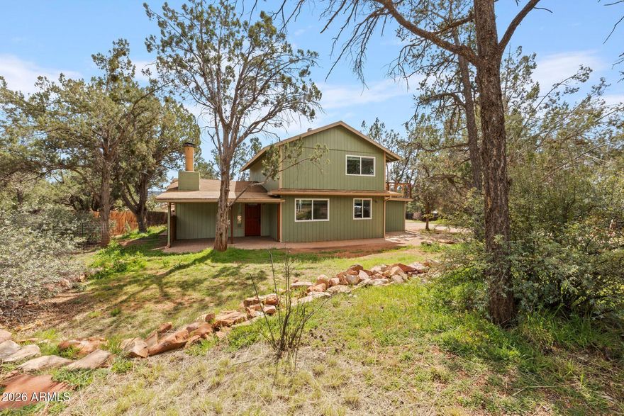 Offering both a main residence and a detached guest cottage, this West Sedona property presents a rare opportunity for flexible living, guest accommodations, or potential income use. This updated 0.60-acre property offers flexibility, income potential, and walkable access to shopping, dining, and area trail systems. The main residence features 3 bedrooms plus a bonus room and 3 bathrooms, including two ensuite bedrooms upstairs. The layout provides separation of space and supports a variety of occupancy options, including full-time living, part-time use, or short-term rental configuration. Recent improvements include remodeled kitchens and bathrooms, Low-E double-pane windows, a new dual pane sliding glass door, new flooring, EnergyStar appliances, mini-split A/C systems, newer central air on the main level, and fresh interior and exterior paint.

The detached guest cottage includes 1 bedroom plus a loft, a private living area, a full kitchen with stove, refrigerator, and sink, and a separate entrance. There is also designated space with a 220 hookup for a stacked washer and dryer. The structure may accommodate extended stays, guests, creative workspace, home office use, or a variety of potential uses, subject to buyer verification.

Opportunities like this are rare in Sedona -- an updated property with a detached guest residence, STR eligibility, no HOA, and space to expand or enjoy outdoor living. Whether you're considering an investment opportunity, a primary residence with income flexibility, or a property designed for adaptable use, this West Sedona offering delivers location, versatility, and long-term value.