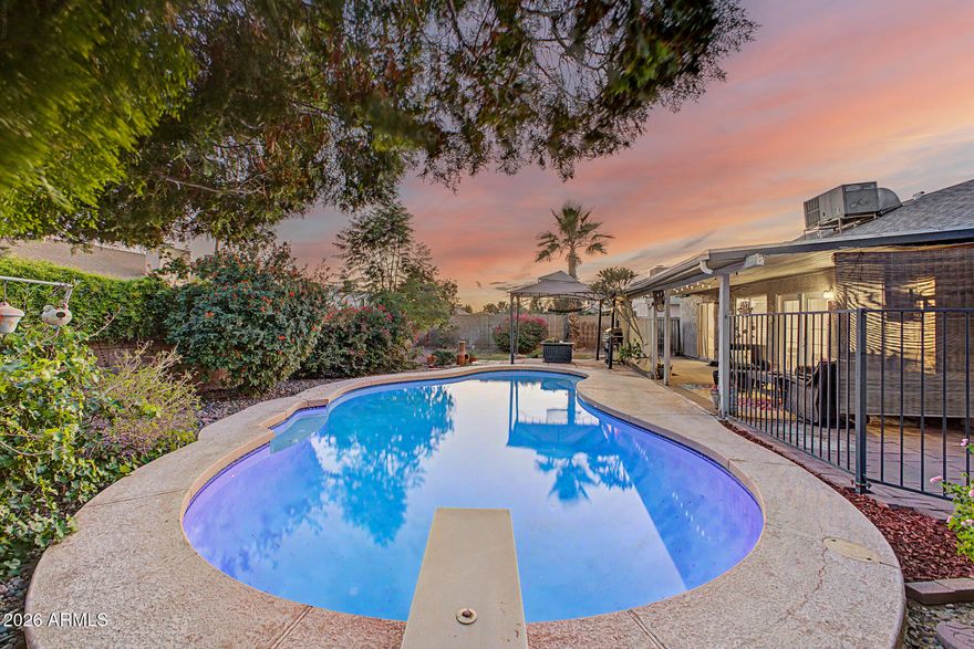 This isn't just another home in North Central Glendale--RV parking and no HOA make this the kind of property that quietly checks boxes most buyers don't even realize they have... until they see it.  Welcome to a beautifully maintained single-level 3 bedroom, 2 bath home designed for both comfort and connection.  With updated flooring and fresh paint you'll really appreciate the easy flow and livable layout.   It's not just a yard, it's your own private retreat. A sparkling pool with newer equipment anchors the space, complemented by an extended covered patio and greenery that sets the stage for  outdoor gatherings or that peaceful morning coffee. It's the kind of setup that makes staying home feel like a getaway. And here's where things get Interesting. There's a feature about this home that most buyers don't expect in this price range--something that adds both lifestyle and value.    Located in the highly desirable North Central Glendale area, you're just minutes from TSMC, Arrowhead Mall, P83 and Westgate with endless dining, shopping, and entertainment options right at your fingertips.