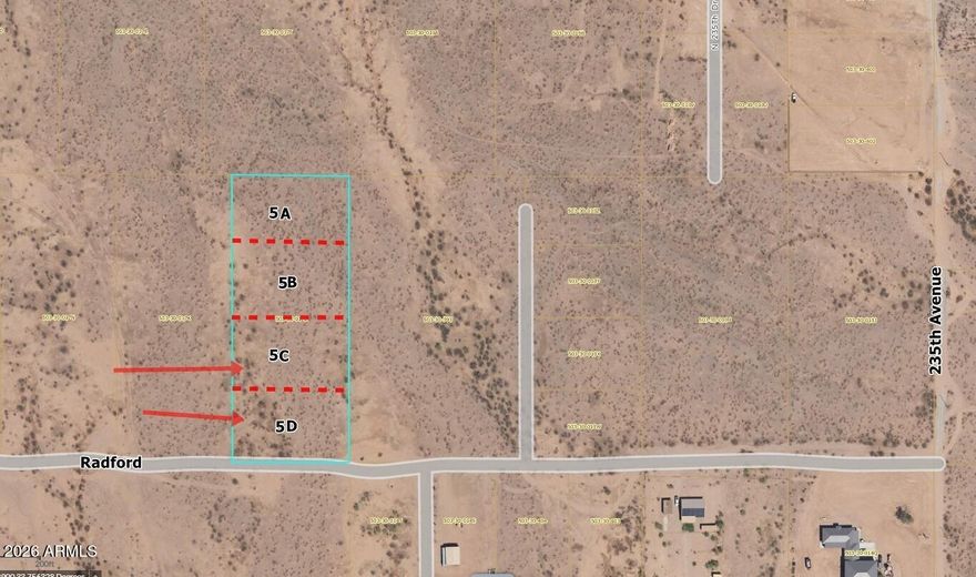Nice flat 2 Acres already surveyed into 2 lots in a rapidly developing area of Wittmann!  2x lots north of this already under contract.    Price includes 2 wellshares!   Access into this area is really nice, with pavement for a good stretch of it, then a rocked road the rest of the way.   This is a perfect setup to put up homes in this area!  This is going to be a busy street with all of the plans in place for several developments; this property will be right in the middle of all of them!  Survey attached in documents.  Power currently at 235th Avenue.  *Has been under grazing lease,  so taxes will rise.* An owner of this property hold an AZ real estate License.