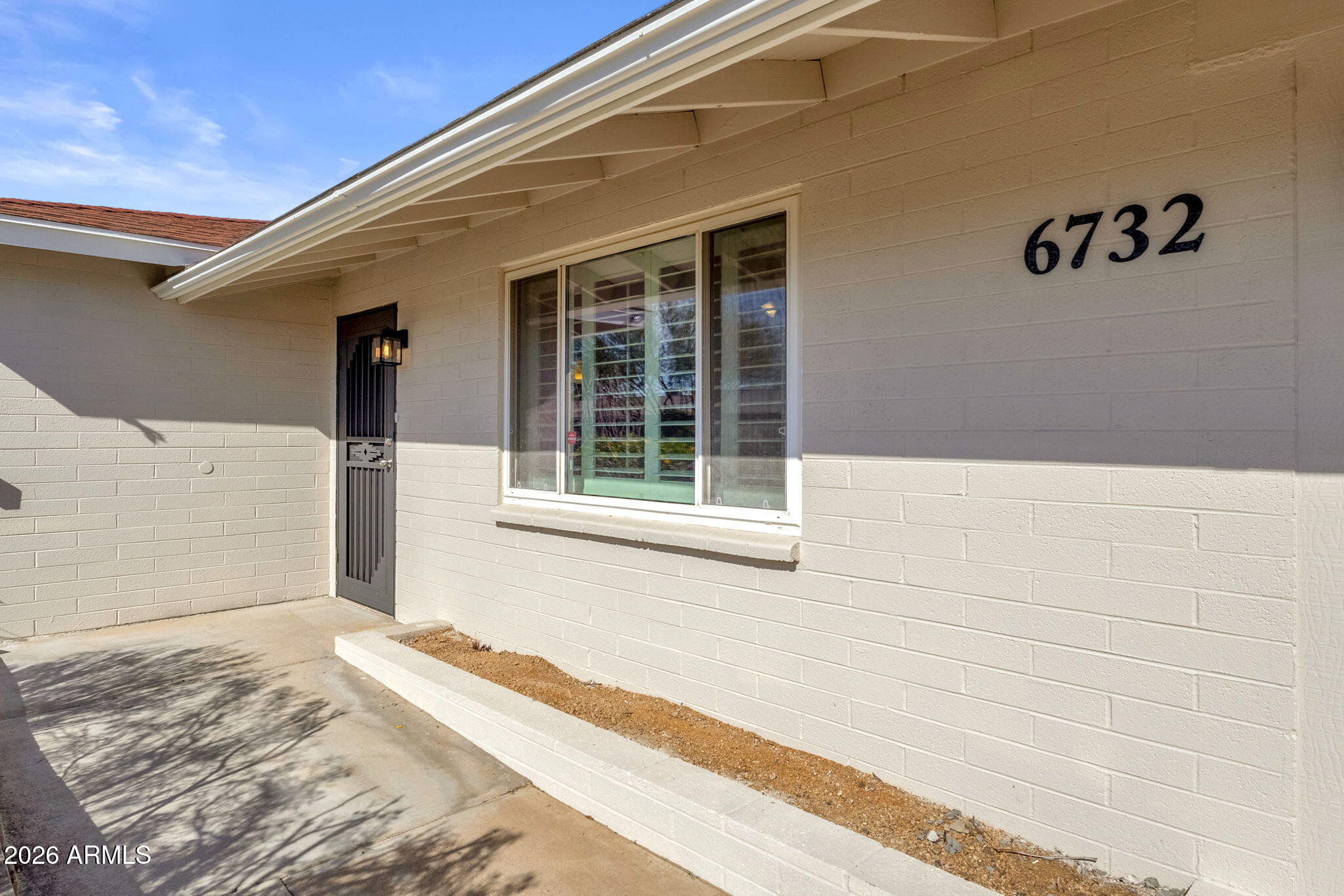 6732 E SHERIDAN Street