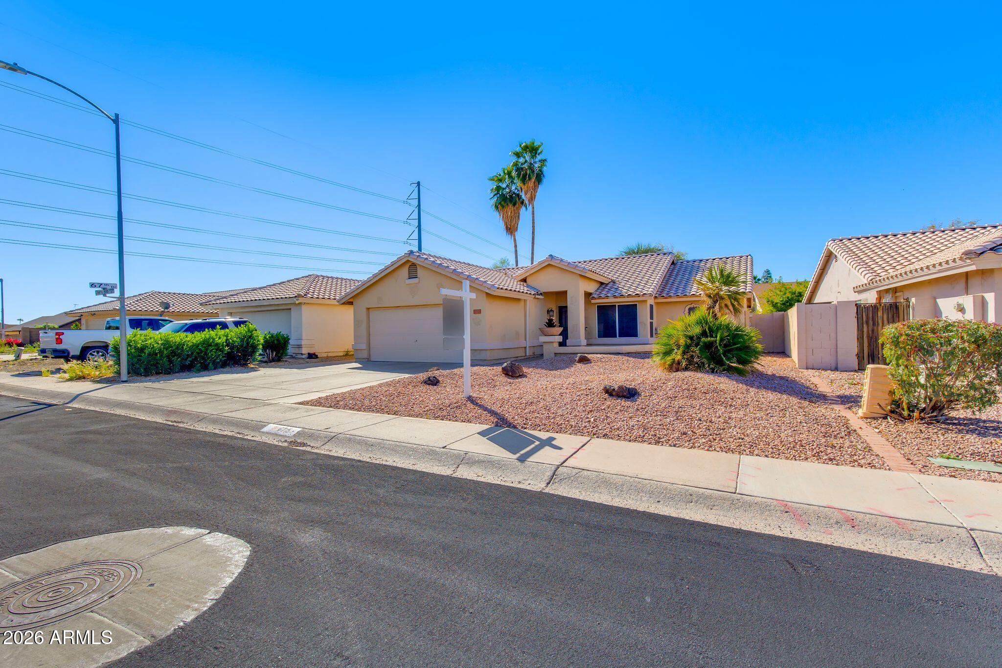 6715 W CHERRY HILLS Drive