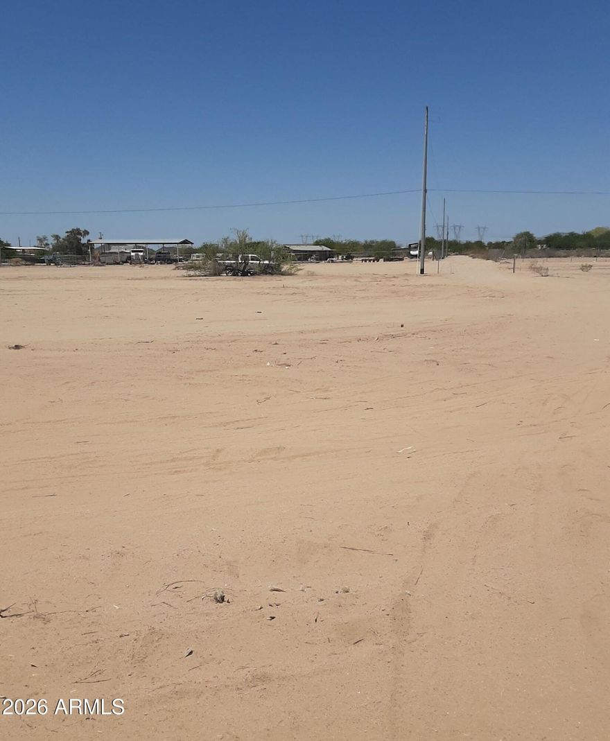 Can you hear that? No? That's the sound of peace and quiet in beautiful Tonopah, AZ. This 1.302-acre vacant lot offers the perfect canvas to build your dream home with room for horses, toys, and everything in between. Electricity is available at the lot line and a shared well is in place, making it easier to get started. Conveniently located near the I-10 and 339th Ave exit, you'll have quick access to fuel, dining, and everyday essentials -- without sacrificing that wide-open desert serenity. The property falls within a floodplain; however, the Maricopa County Flood Control District has confirmed that building is permitted with certain stipulations, and the surrounding neighborhood reflects that with established homes already in place.
