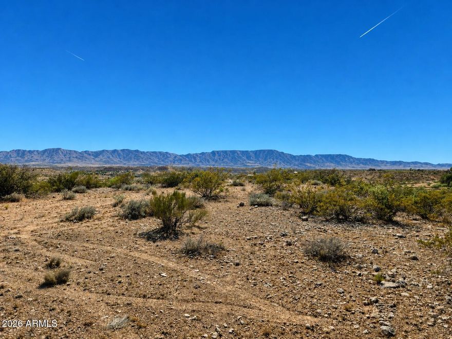 Wide-open views and room to breathe on this buildable 3+ acre lot in the quiet Koch Ranch area of Cornville. Elevated setting captures sweeping Verde Valley and Mingus Mountain vistas, surrounded by site-built homes and natural desert vegetation. A driveway cut and a power transformer is already installed at the parcel, helping streamline future construction and utility hookup. Enjoy a peaceful rural feel just minutes from Cottonwood services, Page Springs wineries, the Verde River and an easy drive to world-class dining and recreation in Sedona. Come design the custom Arizona retreat you've been envisioning.