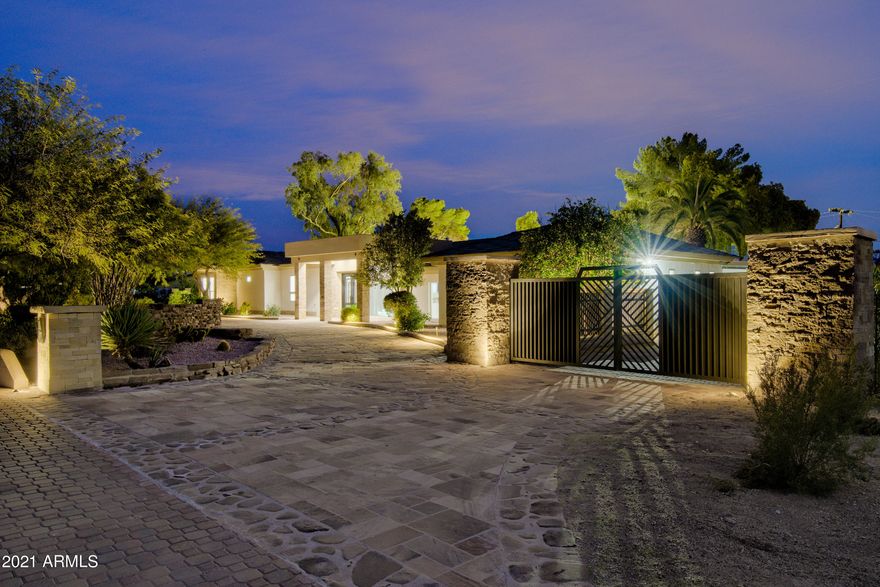 Stunning transitional masterpiece on N/S facing 1-acre lot w/ lush landscaping, full tennis court & separate 1-bedroom guest house w/ full kitchen & living room. Thoughtfully designed & built w/ the highest quality finishes & custom stonework. The open concept floorplan features 2 master suites, a separate office/den, plus an addt'l workout/flex room. The Chef's Style Kitchen & bar area boasts a waterfall edge quartz island, 72'' side-by-side Thermador Fridge, 6 burner gas cooktop, pot filler, double ovens & custom cabinets. An entertainer's dream, taking full advantage of the indoor/outdoor living & resort style backyard w/ pebble tec pool & water feature. Located within the highly coveted 3-Cs school district w/ easy access to the 101 Freeway, countless restaurants & high-end shopping.