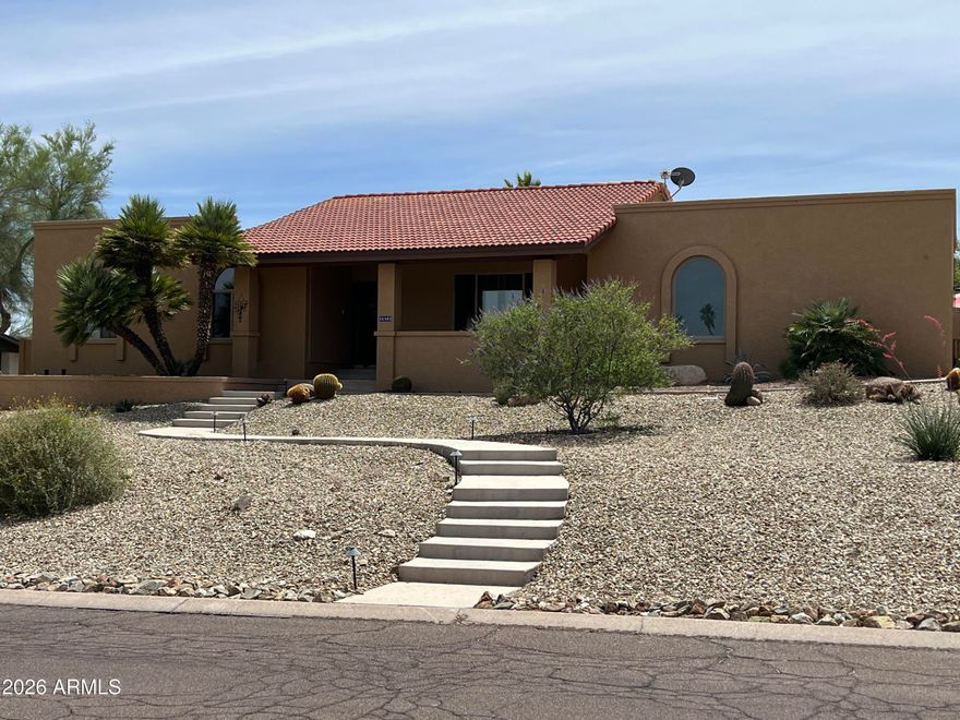 Beautiful move in ready single-level home on a quiet Fountain Hills street! Elevated from the street for added privacy & curb appeal, this 3-bed, 2-bath residence offers mountain views from both the front and back yards. This updated home checks all the boxes,  featuring modern finishes (all tile flooring) & a comfortable, open layout perfect for everyday living and entertaining. Have an RV? There is room for that too!  Enjoy peaceful surroundings less than 1 mile to Fountain Park, with easy access to trails, green space, and local amenities. Ideally located, this home blends style, convenience, and scenic desert living. No HOA. Professional photos coming soon!