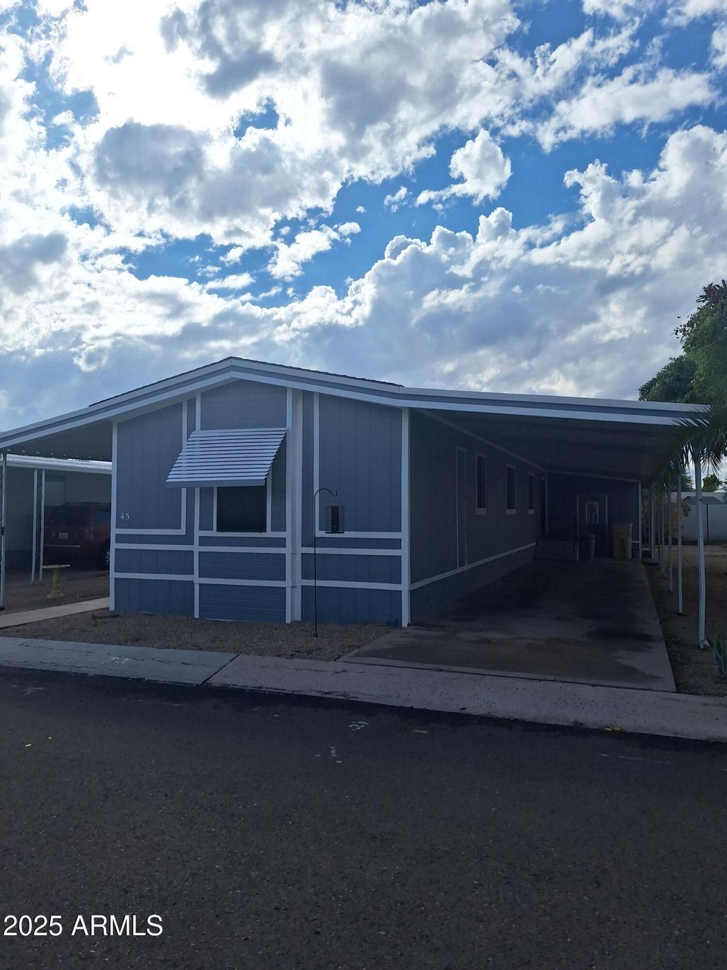 Photo of 6942 W Olive Avenue #45, Peoria, AZ 85345 (MLS # 6933530)
