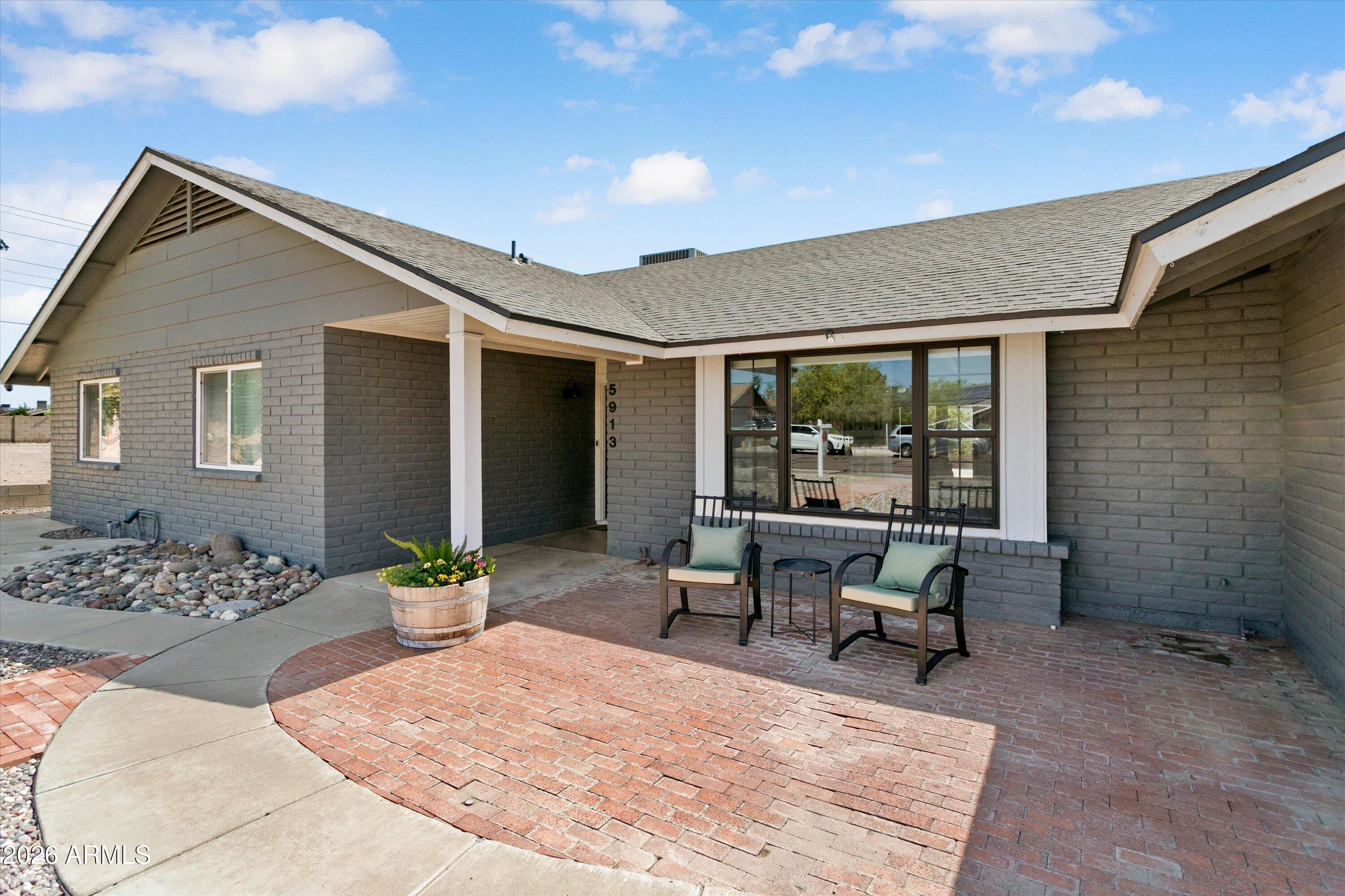 5913 W GROVERS Avenue