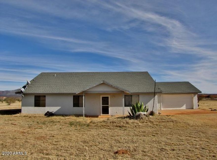 This 3BR/2BA/2CG home is on 4 acres with its own private well minutes from Sierra Vista, AZ, Ft. Huachuca, AZ and Naco, AZ. This 2006 site-built home has a large floor plan with vaulted ceilings and a full length Arizona room. The home has large bedrooms, a great room and a large garage. Enjoy the beautiful views of the Huachuca Mountains.