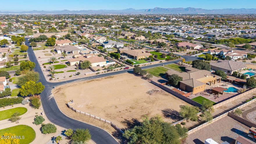 SELLER MOTIVATED! This exceptional nearly 1-acre corner lot is one of the final opportunities to build in the prestigious custom-home community of Sonoqui Creek. Featuring ideal north/south exposure and a south-facing backyard capturing unobstructed San Tan Mountain views, the setting is truly unmatched. With only one adjacent neighbor and a trail bordering the southern edge, the homesite offers both privacy and an elevated sense of openness. Queen Creek water and SRP power are already available. Nestled among high-end custom residences and tucked away from major roads, this lot presents a rare chance to design an estate-worthy home in a coveted Queen Creek location.
