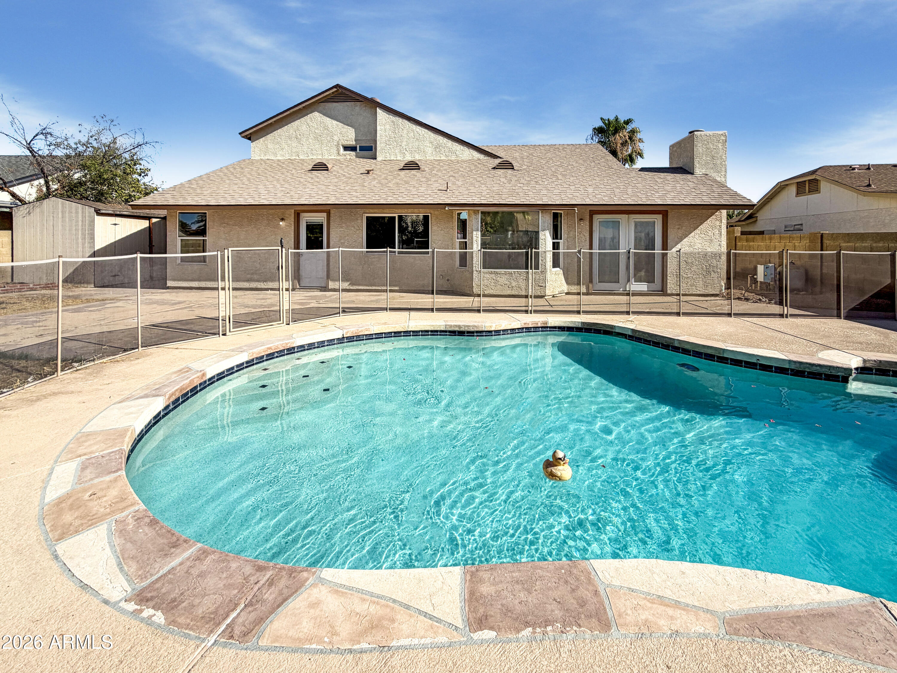6115 W PORT AU PRINCE Lane