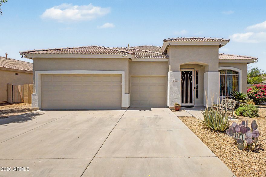 *** Matterport/ Virtual Tour available on ARMLS. 
Unique find in COUNTRY PLACE! This stunning single-level home features a RV gate, 3-car garage and soaring 9ft+ ceilings throughout. Clean and maintained with serviced AC and professionally cleaned ducts.
The interior opens to a formal living room leading into a spacious kitchen equipped with a breakfast bar island, pantry, and an open layout that flows directly into the family room. Large glass sliding doors lead to your backyard, complete with a sparkling heated pool and a covered patio equipped with a mister system--perfect for staying cool while entertaining.
The massive split master suite offers generous space with a sitting area, private backyard door, and an en suite bath with double vanities, a separate tub and shower, and a large walk-in closet with ample "his and hers" storage. Two additional bedrooms share the guest bath that features mirrored double vanities. Indoor laundry room includes built-in storage and provides direct access to the garage. Great Tolleson location with easy access to local amenities!
