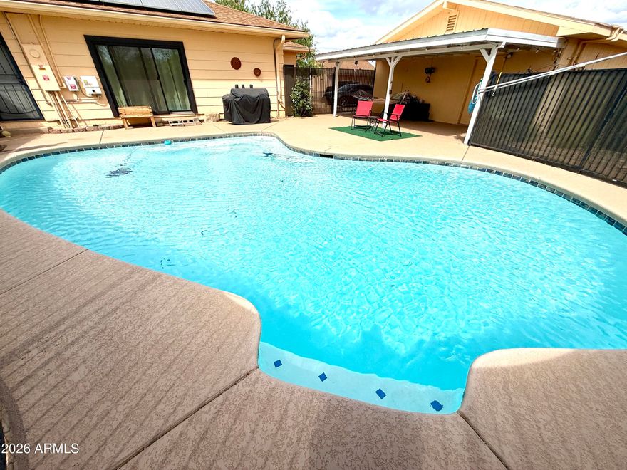 This one of a kind homestead sits on 8 private acres- perfect for birdwatching and stargazing. 

Featuring 5 bedrooms, 3 baths, and a private well, this property also has a beautiful sparkling private pool, Arizona room, & separate mother in law suite offering plenty of room for everyone to live comfortably. 

Custom wood built ins, wood burning fireplace, and stainless steel kitchen appliances.

Exterior highlights include gorgeous mountain views, plenty of room for RV parking, and 5 car garages- offering ample space for vehicles, storage, or workshop use. Ideal for those seeking open space and rural lifestyle. 

Your quiet escape with all the extras is waiting! 

Solar lease will be paid off at closing. Assumable VA Loan 2.75%.