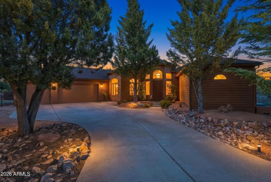 Located in the exclusive gated community of Chaparral Pines, this 3-bedroom, 2.5-bath, single level,  3 car garage, with tons of storage that backs directly to National Forest with stunning views of Diamond Point. The split floor plan offers privacy and functionality, featuring a spacious primary suite with walk-in shower, jetted tub, and custom closet shelving. Two guest bedrooms share a Jack-and-Jill bath with private sink areas. The living room showcases a large panoramic window, while oversized windows throughout the home capture breathtaking forest views. The kitchen includes an induction cooktop, wall oven, large island, soft-close cabinetry, and an oversized walk-in pantry. Enjoy the outdoors on the large partially covered deck, plus a fenced dog run and enclosed garden or private sitting area. Additional features include garage with workroom, central vacuum system, large laundry room with abundant storage, whole-house Nuvo H2O filtration system, and instant hot water. Chaparral Pines amenities include a private golf club, pool, restaurant, park, tennis courts, pickleball courts and a dog park- offering true mountain luxury living.
