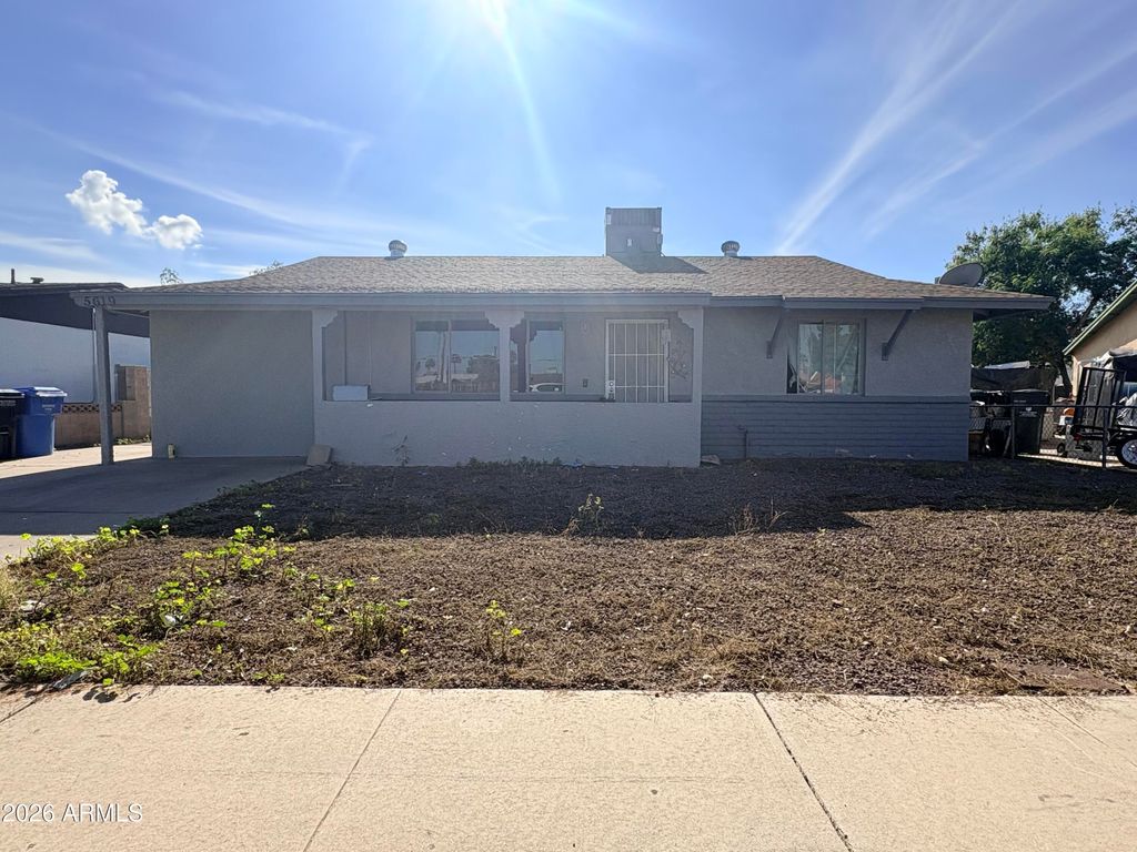 Photo of 5619 W La Reata Avenue, Phoenix, AZ 85035 (MLS # 6974256)