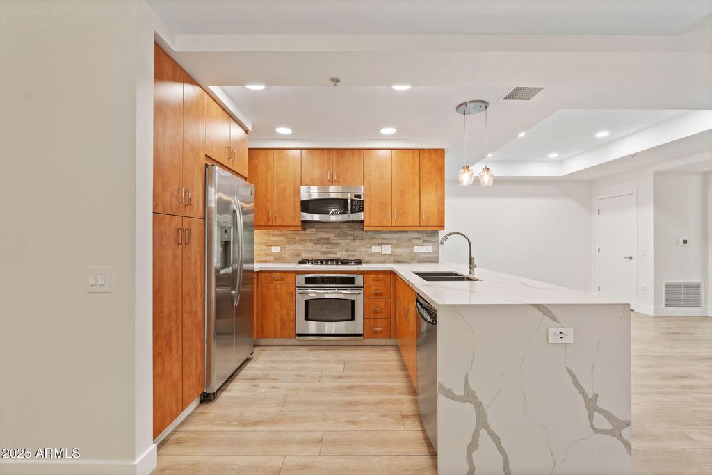 Photo of 7127 E Rancho Vista Drive #2003, Scottsdale, AZ 85251 (MLS # 6935332)