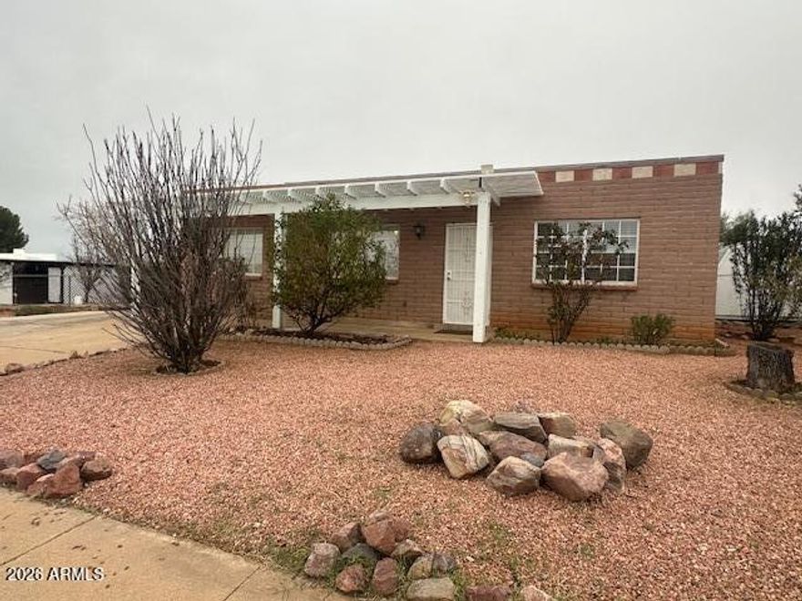 Brick 1472 Sq. Ft. Freshly painted interior 4-bedroom 2 Bathroom Home. Up- dated Kitchen w/ Black appliances Wood cabinets, Stainless steel sink, new backslash. Bathrooms w/Surround tiled in showers and tub. New hall carpet. On Large Beautifully landscape lot with trees, brushes, Grape vines and flowering plants Completely fenced in. With 2 covered patios.