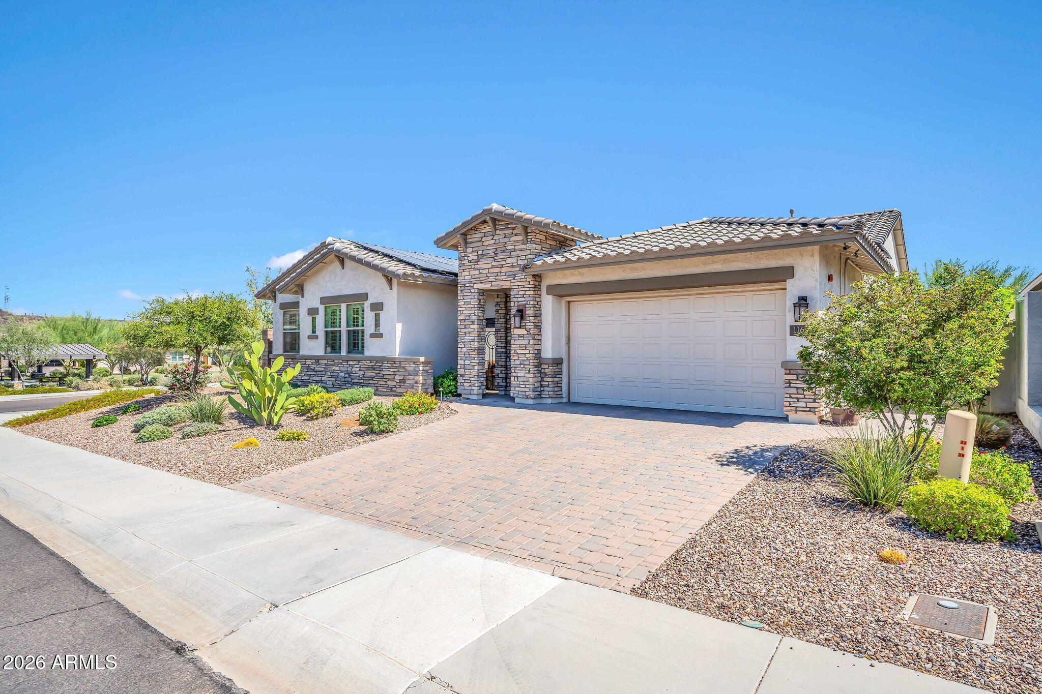 11613 W TENAZA Drive