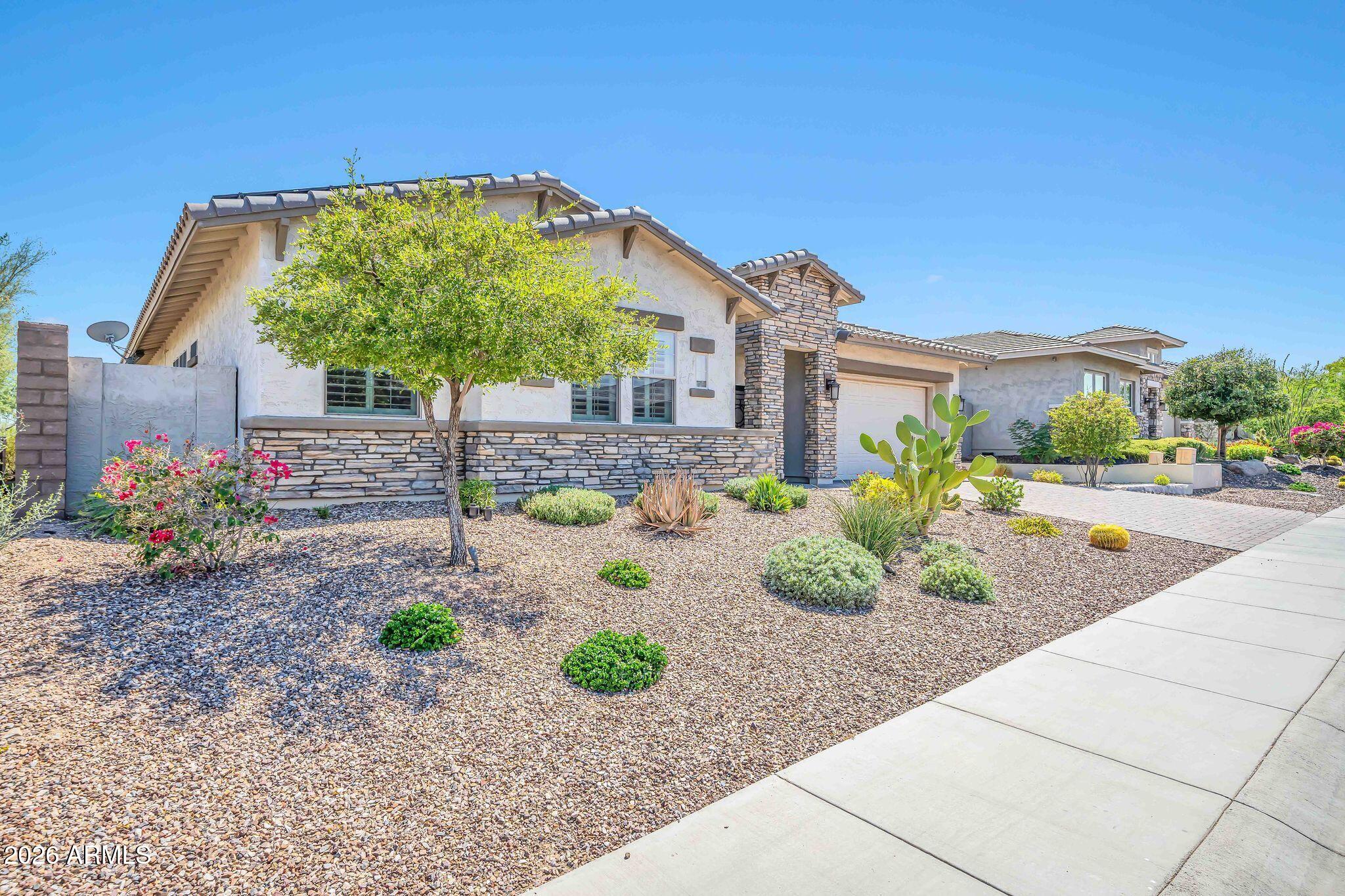11613 W TENAZA Drive