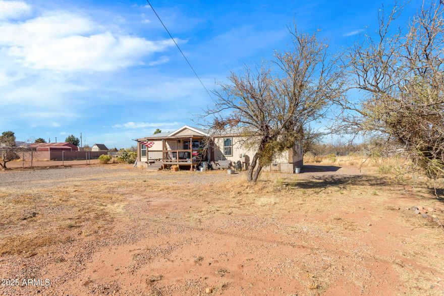 4 bed 2 bath sitting on a serene 1 acre lot. Enjoy the views from one of 3 porches. Covered patio on the front with space for furniture to sit and truly enjoy the property. Granite countertops in the kitchen and an open floor plan make this home one not to miss. 
You will find 2 storage sheds for all our outdoor needs on this fully fenced parcel with rv gate.
